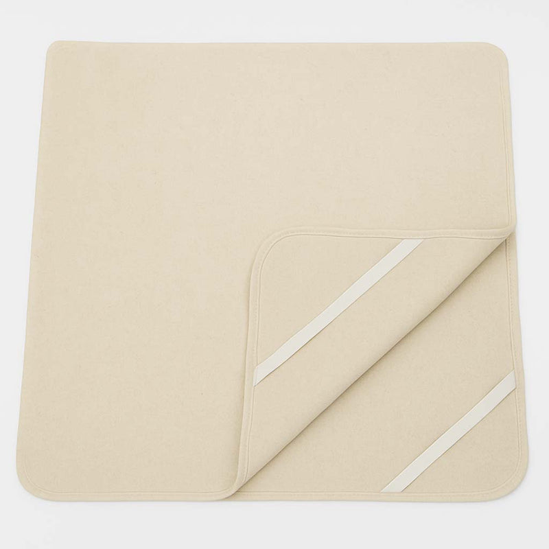 Natural wool mattress protector with elastic corner straps, breathable and chemical-free for added comfort and protection