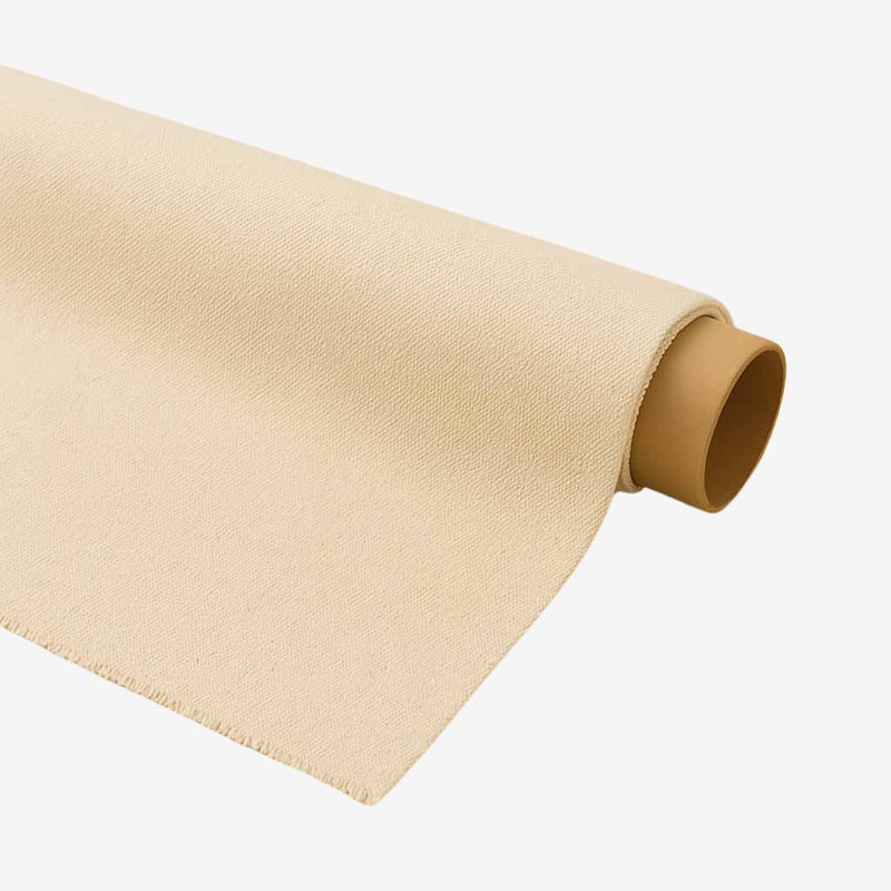 Rolled natural wool fabric in cream color, displayed on a neutral background.