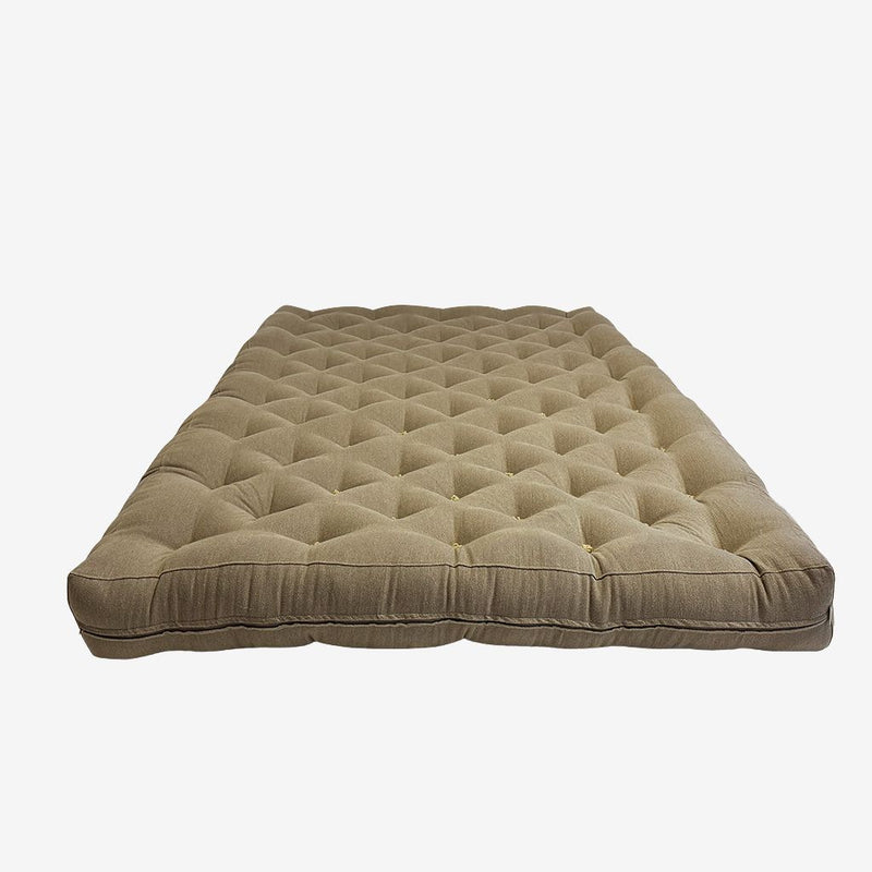 Handmade natural wool mattress in brown linen fabric – top view with diamond tufting.