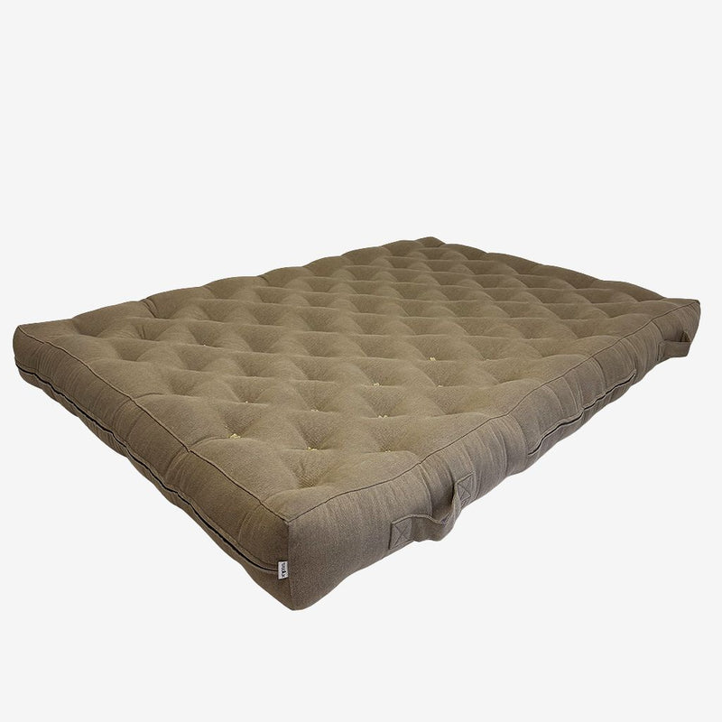 Handmade natural wool mattress in brown linen fabric – top view with diamond tufting.