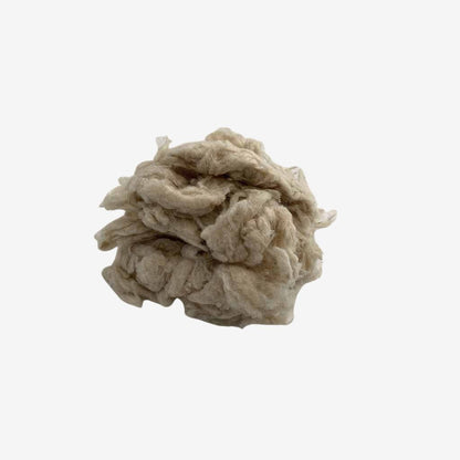 Loose, natural wool stuffing for DIY projects, pillows, cushions, or upholstery – breathable, chemical-free, and sustainable..