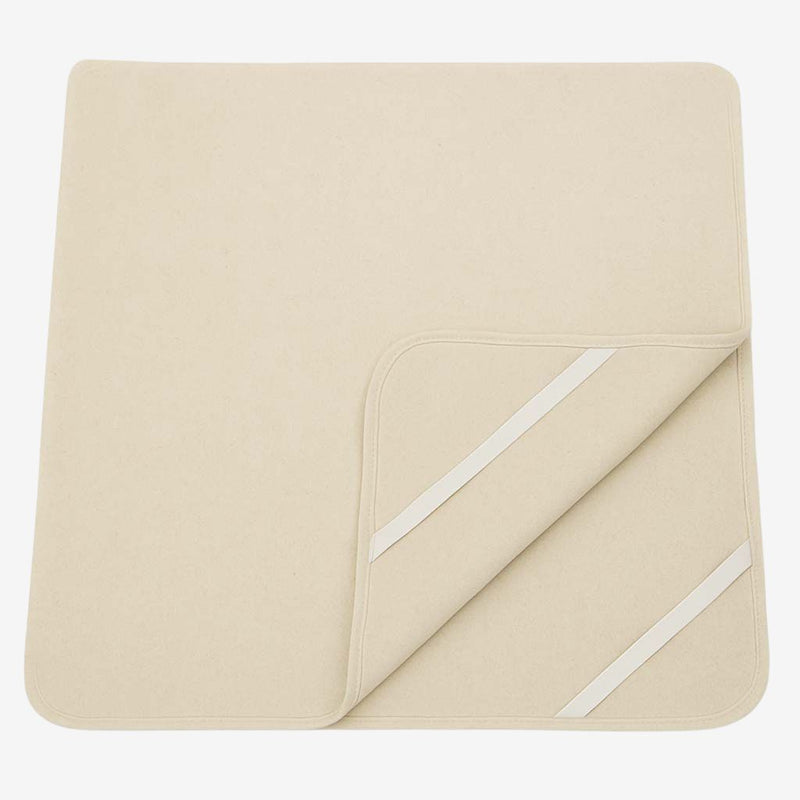 Natural wool mattress protector with elastic corner straps, breathable and chemical-free for added comfort and protection.
